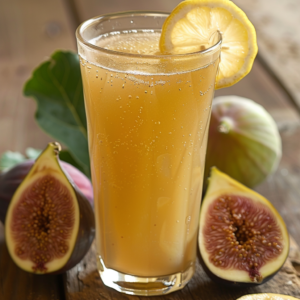 A tall glass of our invigorating Citrus Sunrise juice, bursting with zesty goodness, graces a wooden table. Garnished with a fresh lemon slice, this vibrant drink is surrounded by whole and halved figs, showcasing the luscious bounty of nature’s best. A fig leaf in the backdrop adds an eco-friendly touch to this refreshing scene. Perfectly blending health and freshness, Citrus Sunrise is a delicious testament to Zestful Blends’ commitment to vitality and flavor.